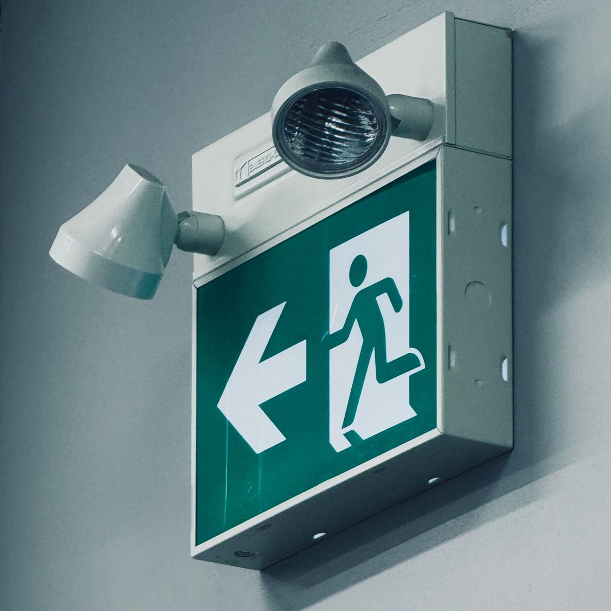 Emergency exit sign, Martyn's Law evacuation plan requirements
